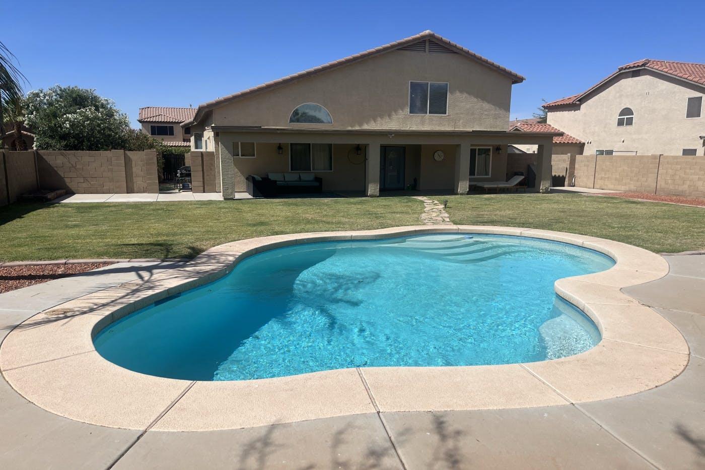 RBV sparkling pool, large grassy yard, shaded cabana, outdoor fire pit & more