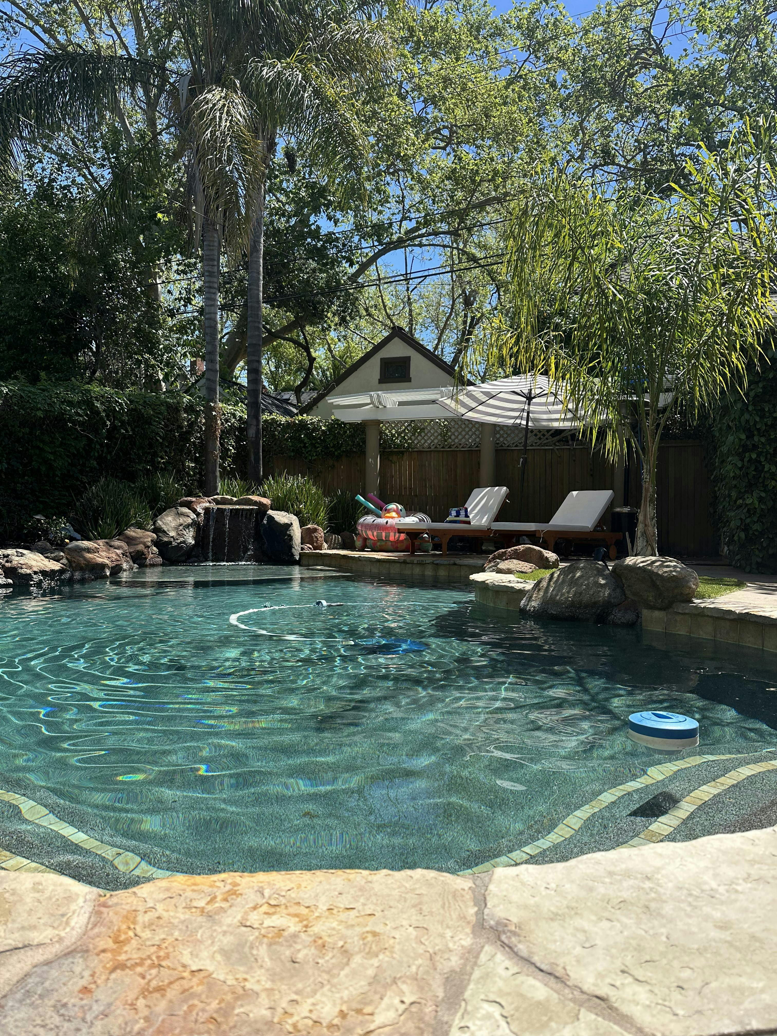 East Sac saltwater pool w/ outdoor kitchen and gameroom access