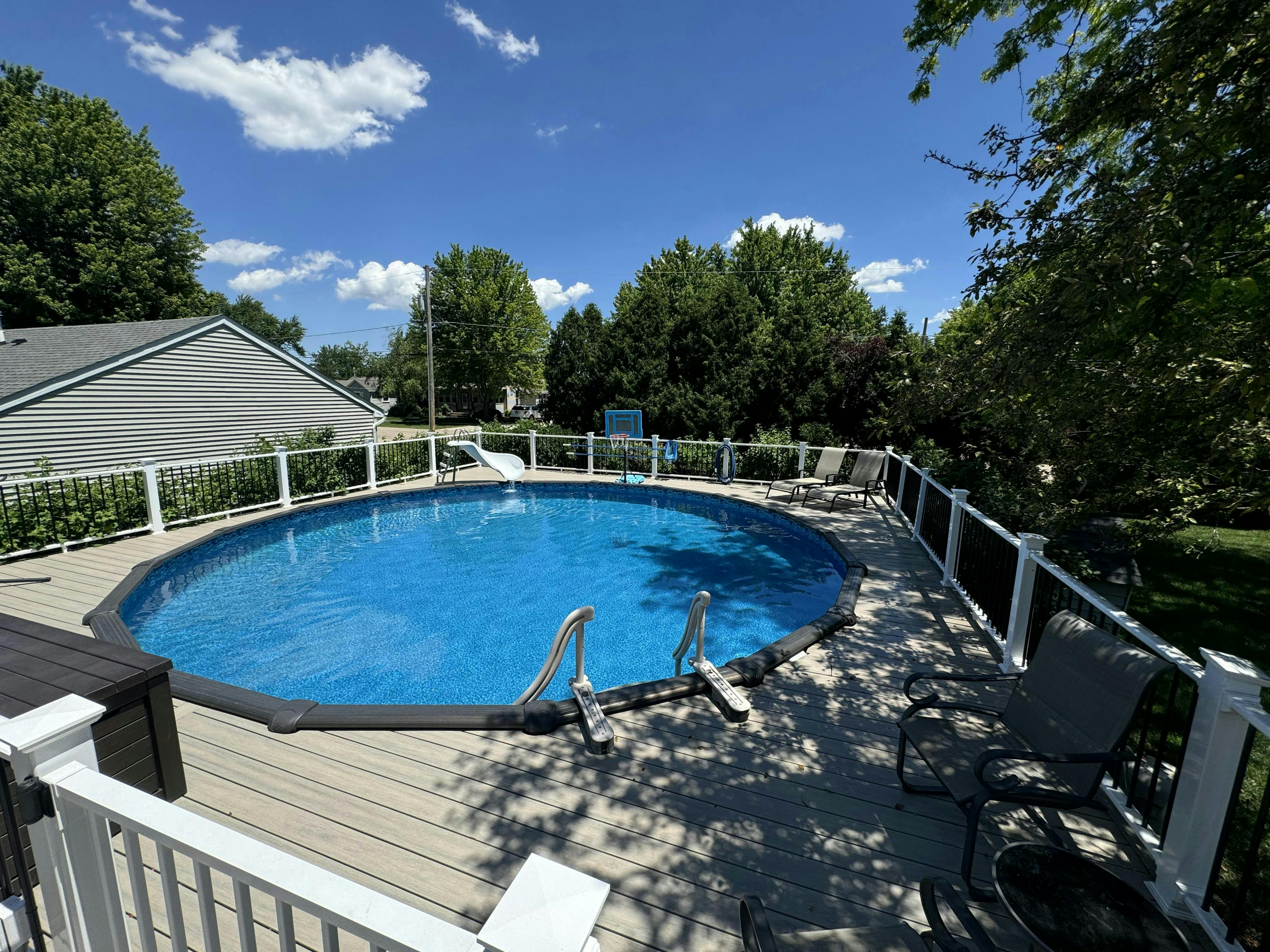 Heated pool, water slide, basketball hoop,  plenty of seating, lounge chairs, huge fenced yard all yours with a real bathroom and privacy.