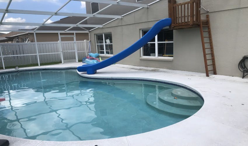Slide into the pool!! Hot tub included